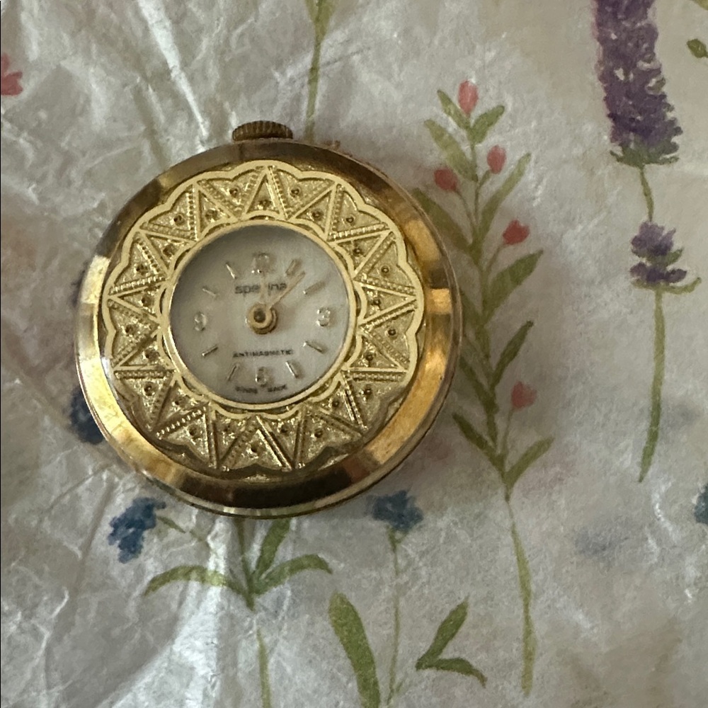 Vintage gold-tone Lucerne Swiss made